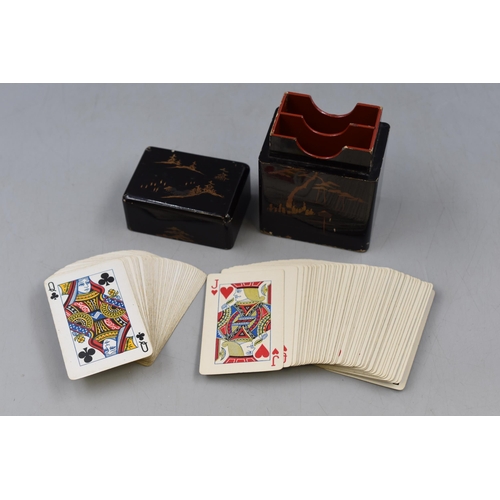 110 - A Vintage Lacquered Japanese Black and Gold Wooden Card Box, With Two Sets of Playing Cards. Box AF,... 