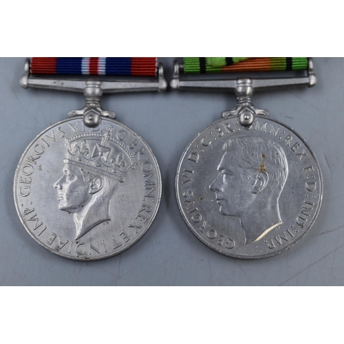 158 - Selection of WWII Medals, includes Two Star Medals, Defence Medal and Service Medal