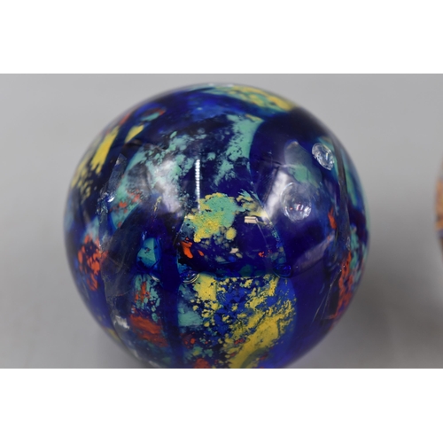 169 - Four Glass Ball Paperweights, Includes Floral, Spiral and More. AF.