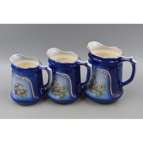 294 - Set of Three Graduating Blue and White Pottery Water jugs Depicting Romantic Lovers Scenes largest 7... 