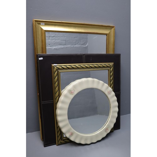 300 - Four Mirrors including two Gilt Framed, Leather Framed and Circular Ceramic Framed (Largest 36