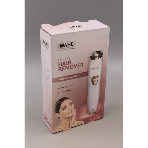 348 - A Boxed Wahl Facial Hair Remover, Powers on.