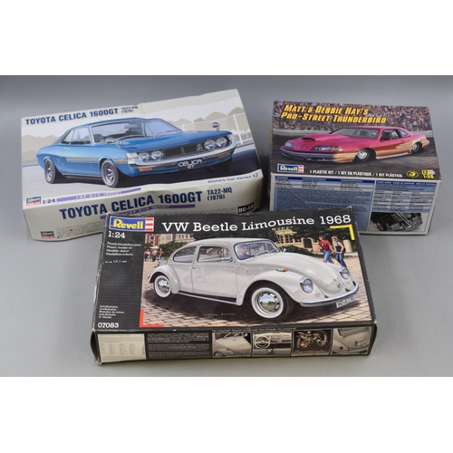 387 - Three Part made Vehicle model kits to include Revell VW Beetle limousine and a Hasegawa Toyota Celic... 