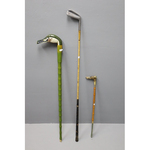 529 - Three Novelty Walking Sticks including Ducks Head, Bamboo and More