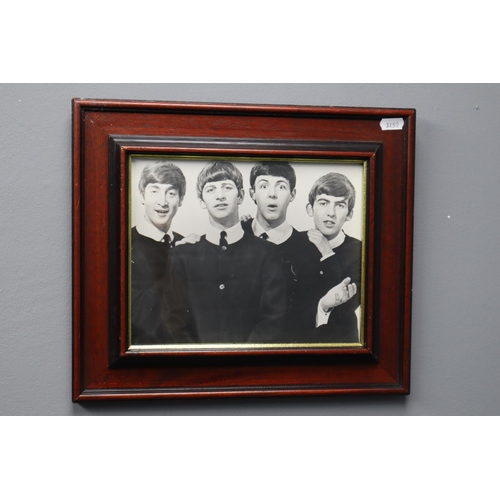 657 - Four Framed and Glazed Black and White Photographs of The Beatles 14