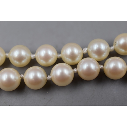 32 - A Designer 'Delta' Two Strand Faux Pearl Necklace, With Tag.