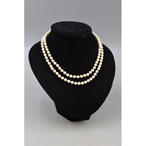 32 - A Designer 'Delta' Two Strand Faux Pearl Necklace, With Tag.