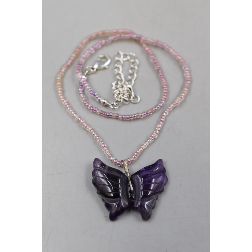 50 - A Beaded Amethyst Butterfly Necklace