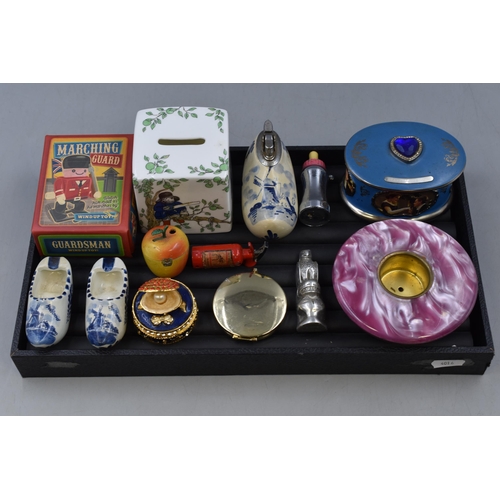 98 - Mixed selection including Paddington Money Box, Delft Ware, Trinket Box, Compact, Lighters and More