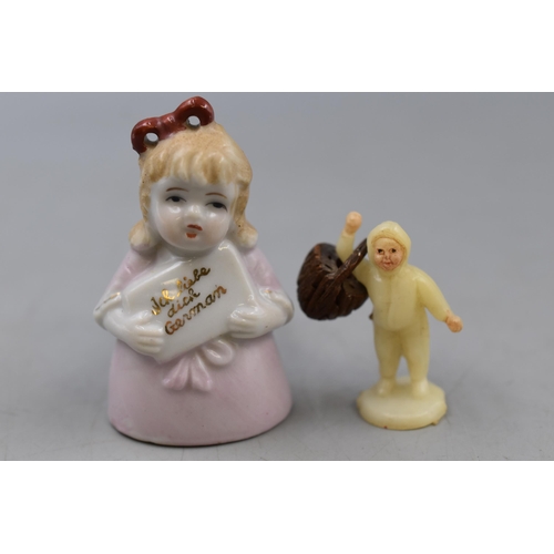 111 - Two Figures. Includes Little Girl German Porcelain Translation Figure and Plastic Boy Holding Basket... 