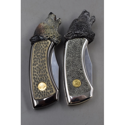 115 - Two Franklin Mint Wolf themed Collectors Knifes complete with Cases