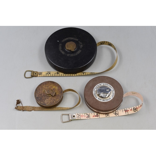 127 - Three Vintage Tape Measures. Includes Chesterman, Ufkin Sterling, and Other.