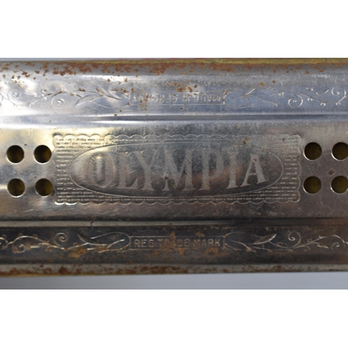 129 - A Vintage Olympia Double Harmonica