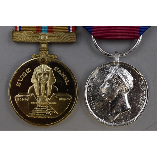 162 - Suez Medal (1951 - 1954 & 1956 - 1957) Complete with Ribbon and Case and a Reproduction Waterloo... 