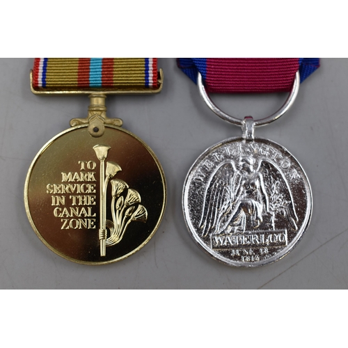 162 - Suez Medal (1951 - 1954 & 1956 - 1957) Complete with Ribbon and Case and a Reproduction Waterloo... 