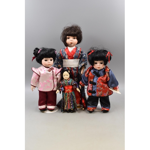 284 - Four Japanese Porcelain Dolls includes 3 Complete with Stands (16