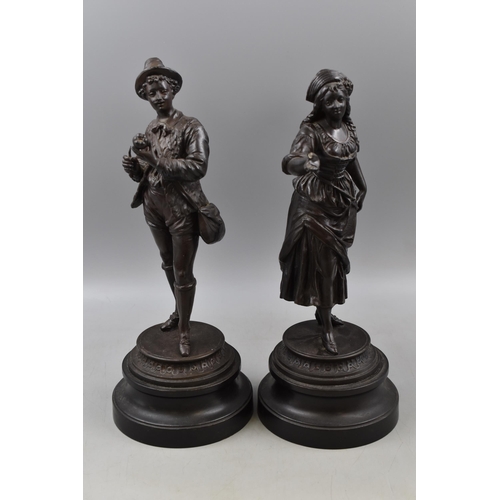 195 - A Pair of Metal Bronze Effect Statues Depicting Tudor Male and Female, On Plinths. Approx 14.5