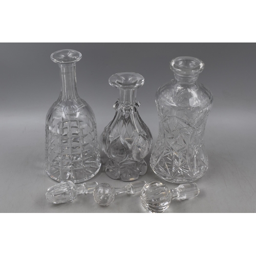 252 - Three Cut Glass Decanters, With Stoppers. One Stopper AF.