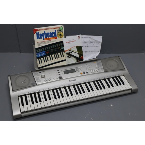 688 - A Yamaha PSR-E303 Electronic Keyboard, With Accessories In Keyboard Bag. Powers on When Tested