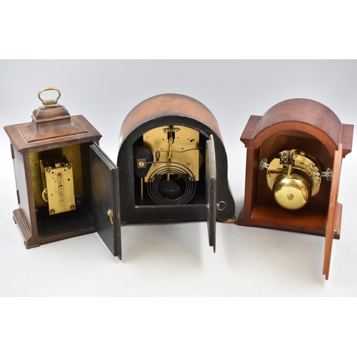 300 - Three Vintage Wood Cased Mantle Clocks to include Rapport, Smiths and a Tempus Fugit That was awarde... 