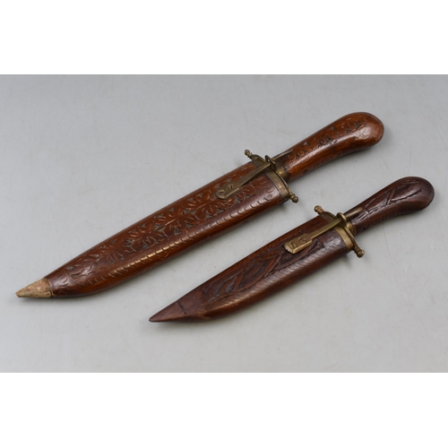 116 - Two Indian Hand Carved Hardwood Knives with Wooden Sheaths