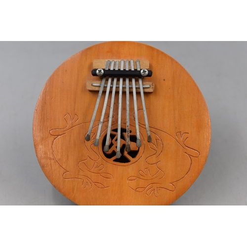 142 - Hand Made Australian Aboriginal Nutshell Kalimba Instrument approx 6