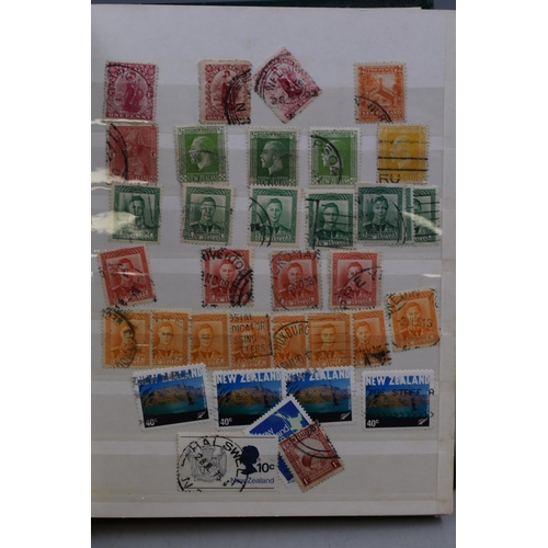 426 - Folder Containing a large Selection of Pictorial and Definitive World Stamps