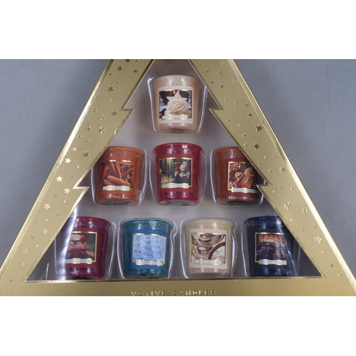 438 - Three Boxed Votive Scented Candle Sets, Each Box Contains Eight Candles.