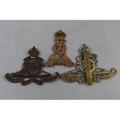 155 - Three Military Badges. Includes Royal Infantry and Pioneer Corps.