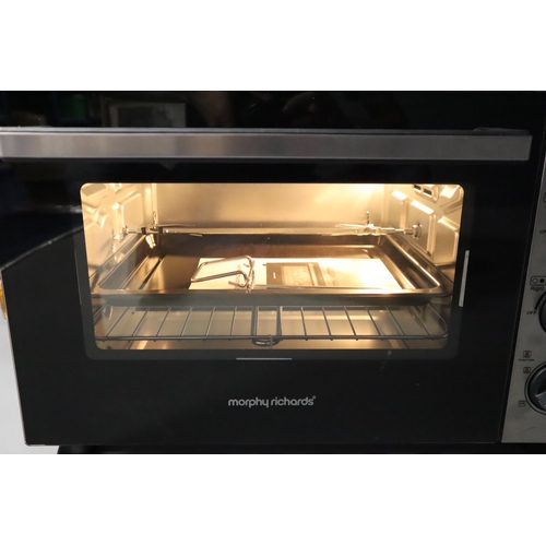 502 - A Morphy Richards Convection Mini Oven With Rotisserie, 28L Capacity. In Original Box, Powers On Whe... 