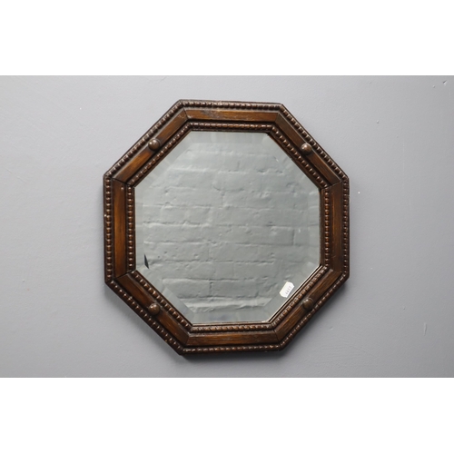 583 - Mid Century Hand carved teak framed Beveled Edged Hexagonal Mirror approx 15.5