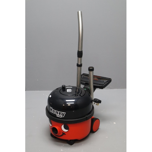 657 - Numatic Henry 200 Vacuum Cleaner with Attachment's but no Hose (Powers On)