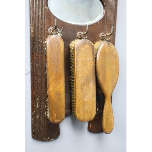 329 - Vintage Clothes Brush and Mirror Set wall hanging