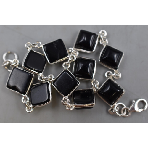 58 - 925 Silver Bracelet with Diamond Shaped Black Stone Design