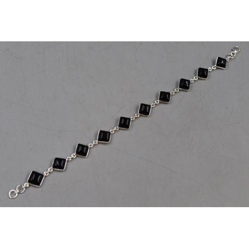 58 - 925 Silver Bracelet with Diamond Shaped Black Stone Design