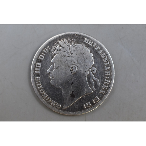 127 - An 1824 George IV UK Silver Shilling