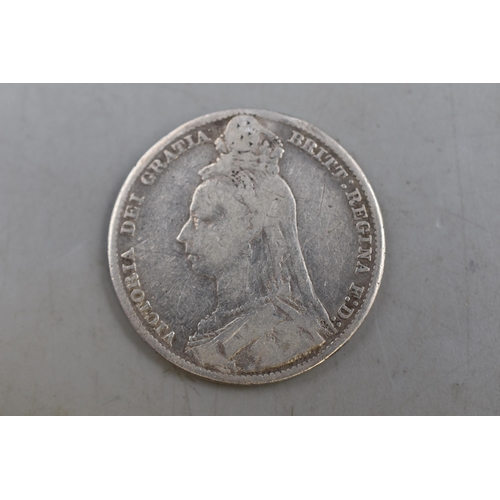 128 - An 1890 UK Silver Victorian Shilling