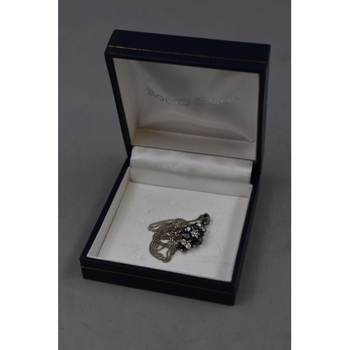 217 - A 925. Silver Clear and Black Stoned Pendant, On Silver Chain. With Presentation Box