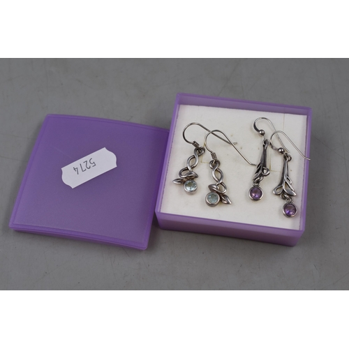 227 - Two Pairs of 925. Silver Macintosh Style Earrings. Includes Purple Stoned and Blue Stoned. With Pres... 