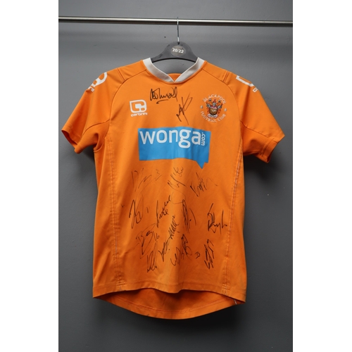 732 - A Signed Child's Blackpool FC Shirt, From Either 2010 or 2011.