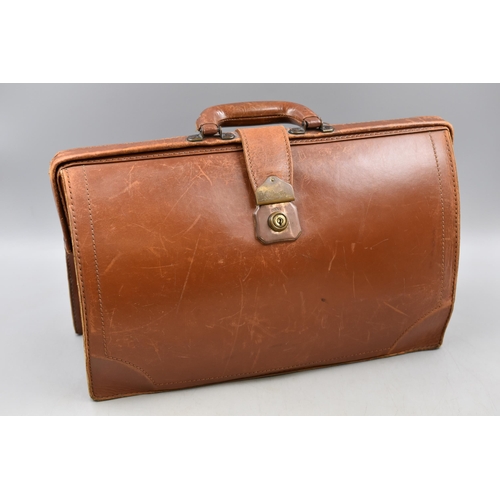 733 - A Vintage Leather Briefcase, Monogrammed 'P.E. Preston'.