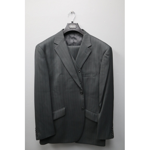 731 - A Black and Grey Pinstriped Milan Collection Three Piece Suit, In Suit Carrier. Jacket is Size 48R, ... 