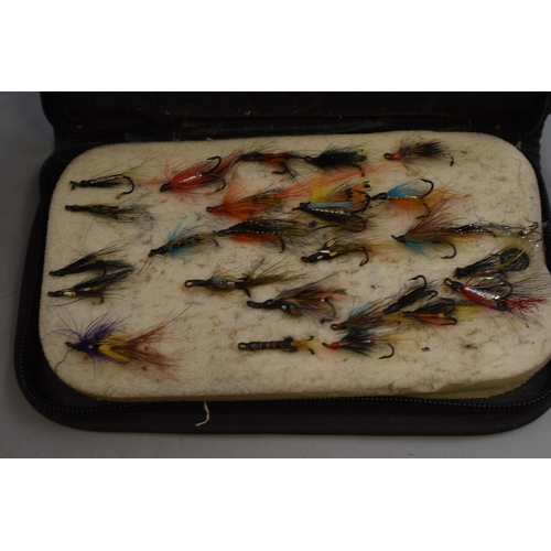 383 - A Selection of Fishing Accessories. Includes Flies, Rubber Tail Spinners and Other