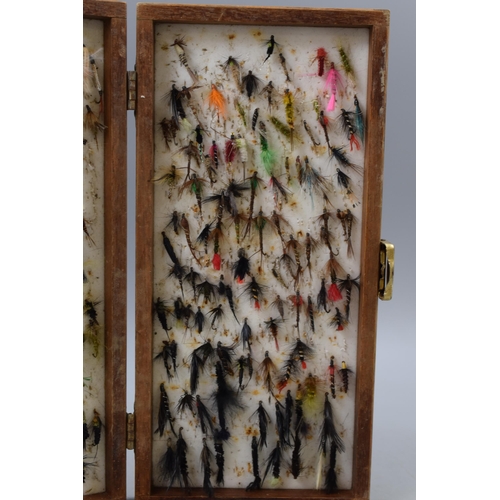 384 - A Wooden Box, Containing a Large Selection of Fishing Flies