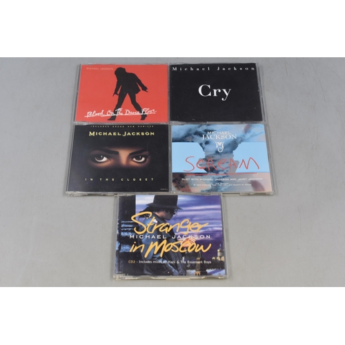 423 - A Selection of Michael Jackson CD's and DVD's. Includes 'Cry', 'In The Closet', 'Blood on the Dancef... 