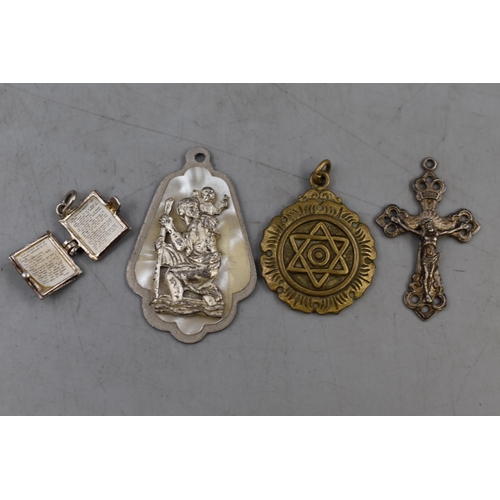 22 - Selection of 4 Religious Pendants including Bible Containing Lords Prayer