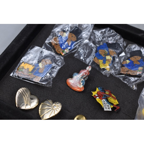 127 - Collection of metal Enameled Badges to Include Paddington Bear, Rupert the Bear, Spiderman and Six V... 