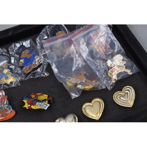 127 - Collection of metal Enameled Badges to Include Paddington Bear, Rupert the Bear, Spiderman and Six V... 