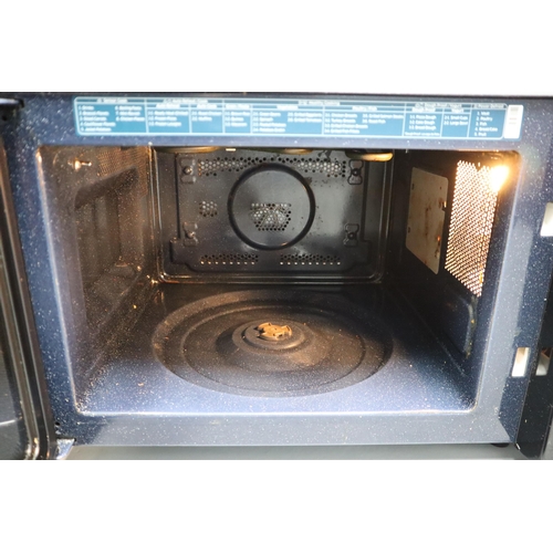 Samsung Smart Oven Model MC28A5125AK. Powers on but not fully tested