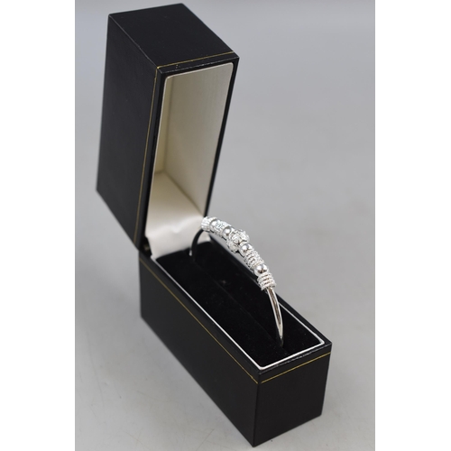 20 - A 999. Silver Beaded Bangle, In Presentation Box